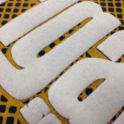 White swell with yellow silk-screen printing